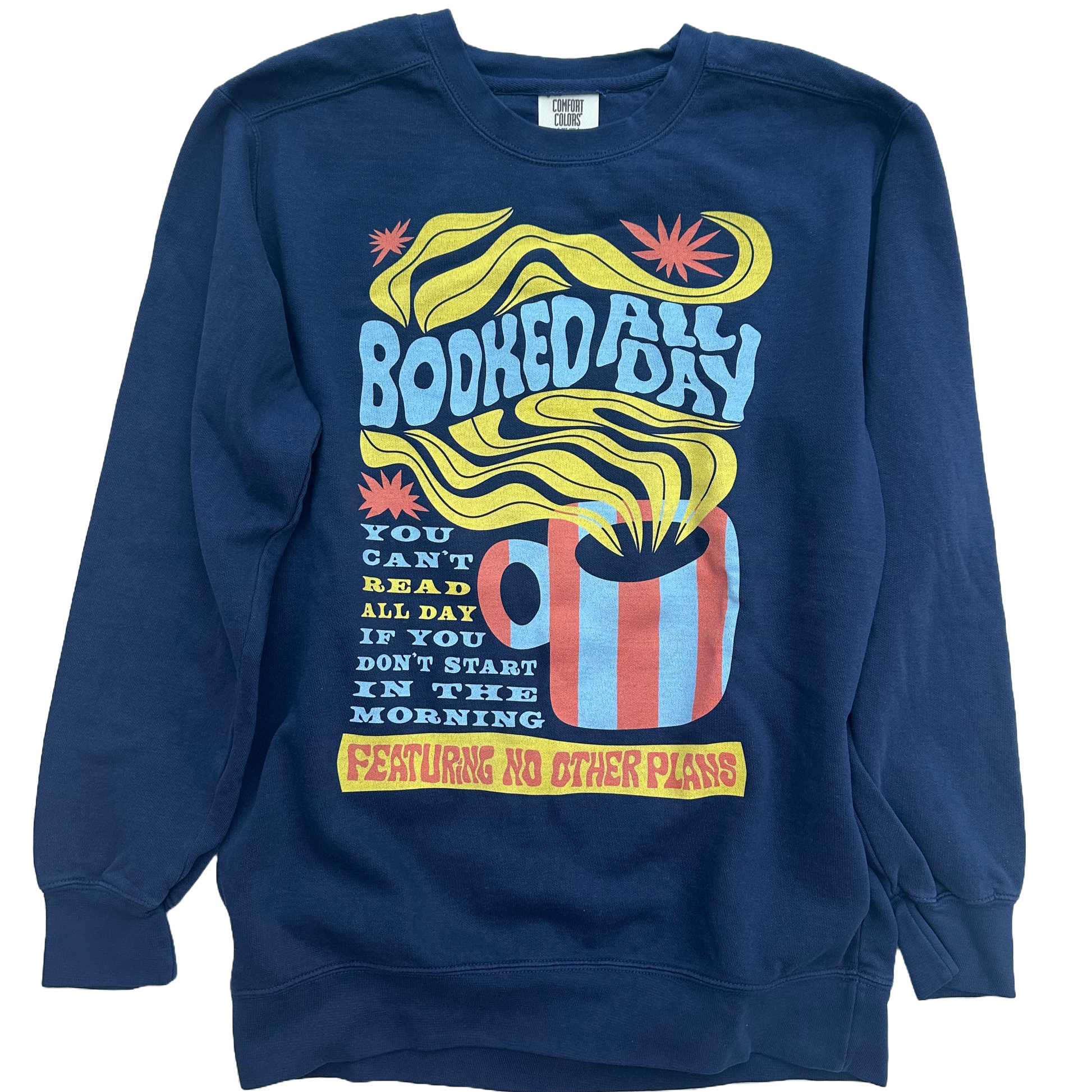 Folded navy blue sweatshirt with colorful graphic design on a white background