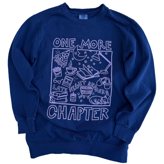 Blue sweatshirt with purple graphic and text