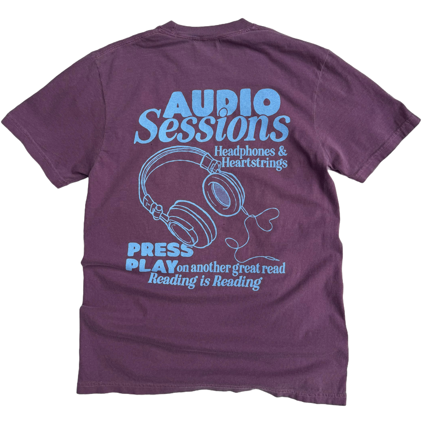Purple long-sleeve shirt with blue text and graphics