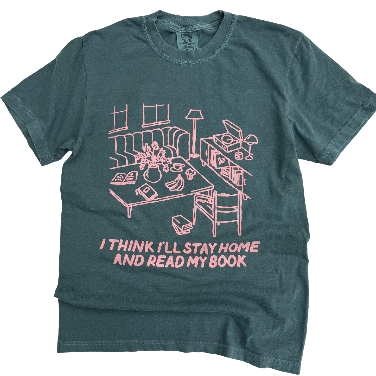 Green t-shirt with pink graphic and text on a white background