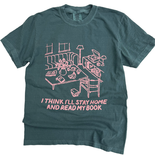 Green t-shirt with pink graphic and text on a white background
